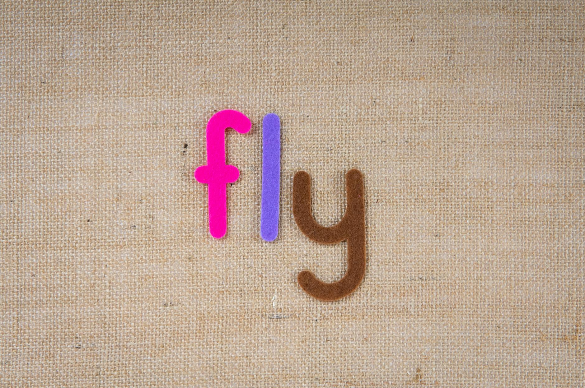 colorful letters on brown background